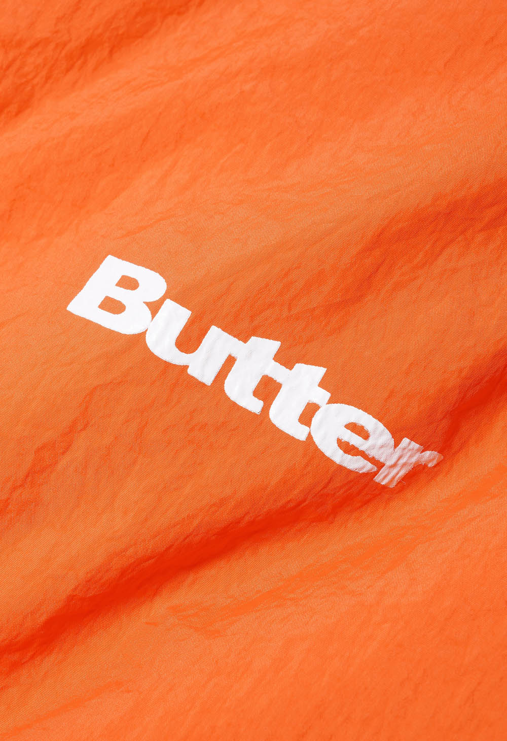 BUTTER GOODS CHAINLINK REVERSIBLE PUFFER JACKET